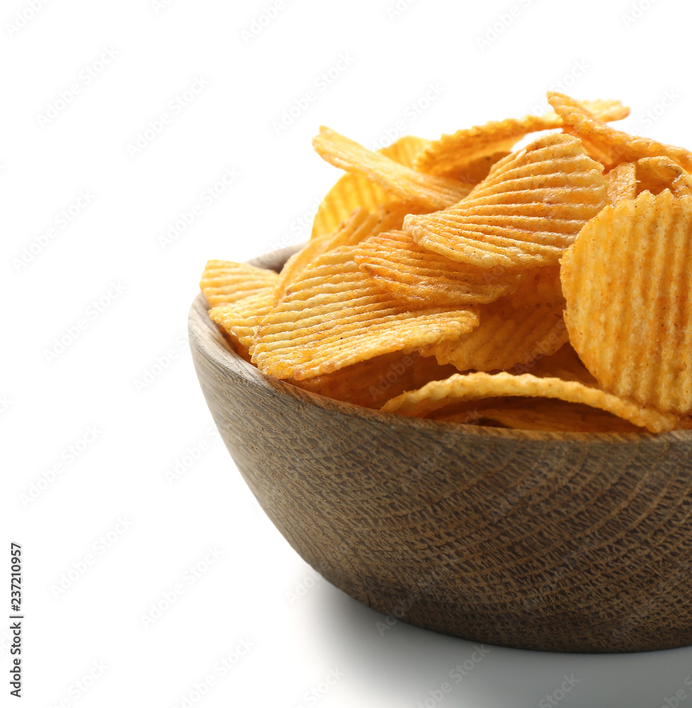 Bowl with tasty potato chips on white background