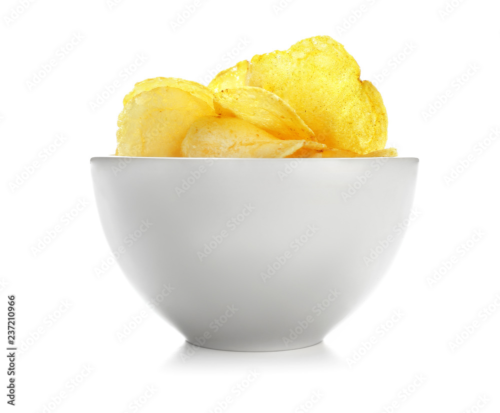 Bowl with tasty potato chips on white background