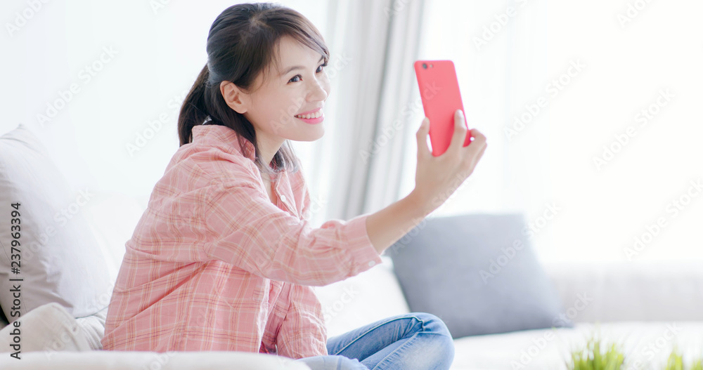 woman take selfie by phone