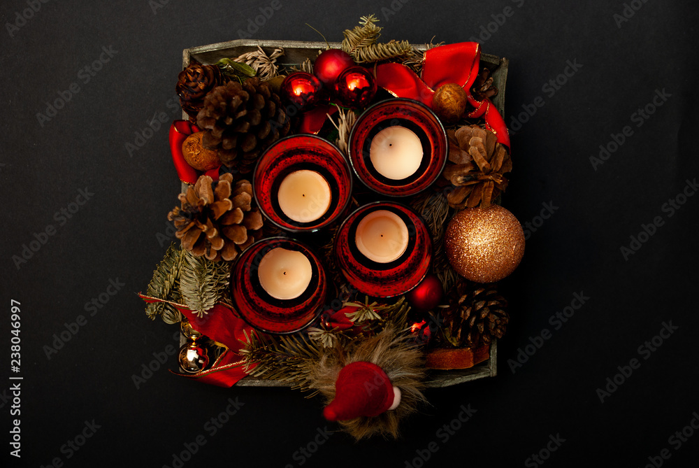 Top view of Advent wreath on black background