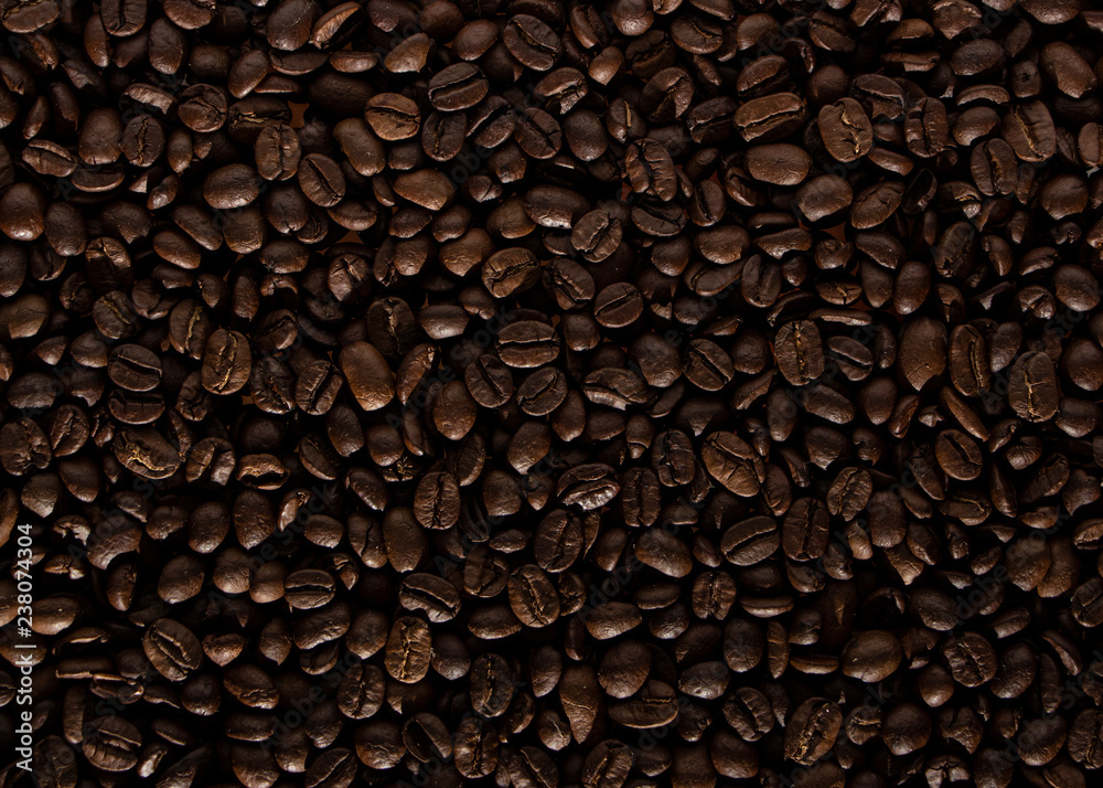 Coffee beans on the table background blurred abstract blurred