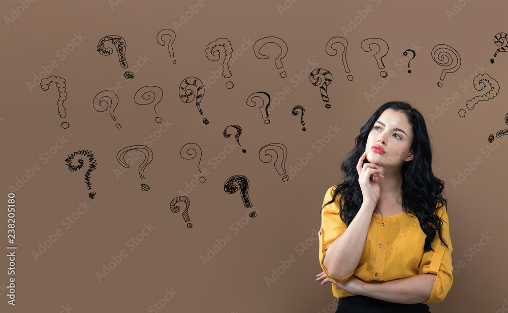 Small question Marks with young businesswoman in a thoughtful face