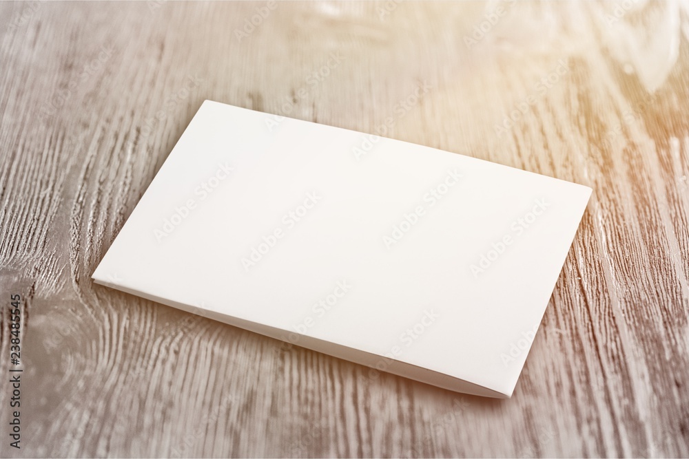 Pile of blank paper on wooden table