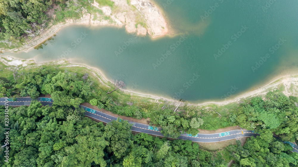 Aerial photo from flying drone of bicycle lane around the dam,beautiful nature landscape in phuket t