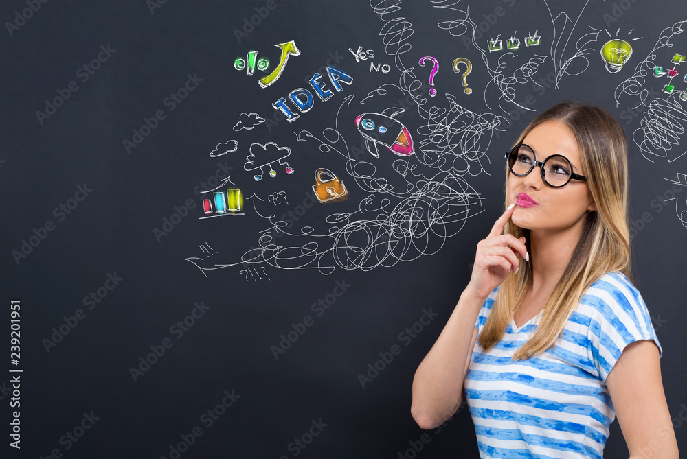 Many thoughts with young woman in front of a blackboard