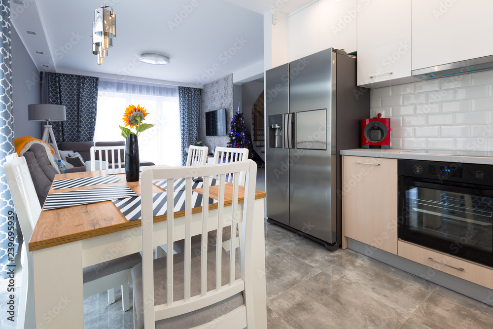 Modern kitchen interior with dining table