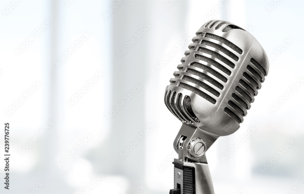 Retro style microphone on  background