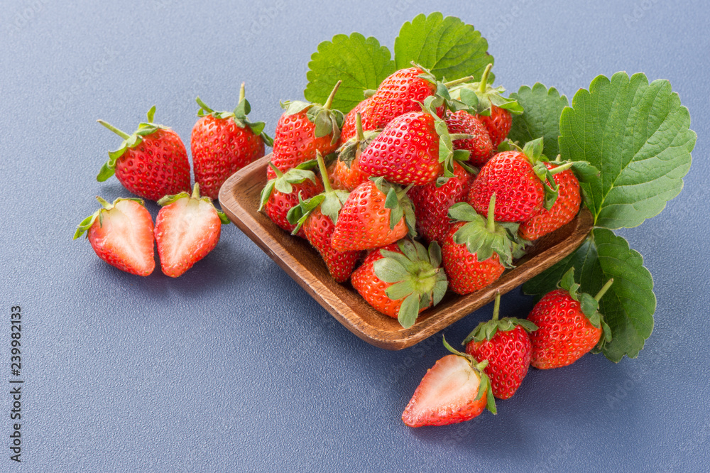 A beautiful and delicious strawberries set isolated on colorful background, close up, macro, copy sp