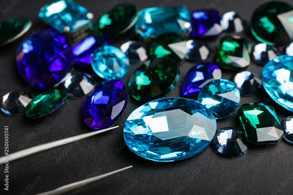 Precious stones for jewellery on dark background