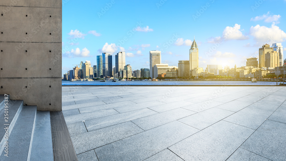 Empty square floor and Shanghai Bund commercial building