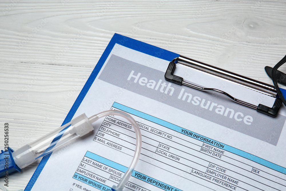 Health insurance form on white table