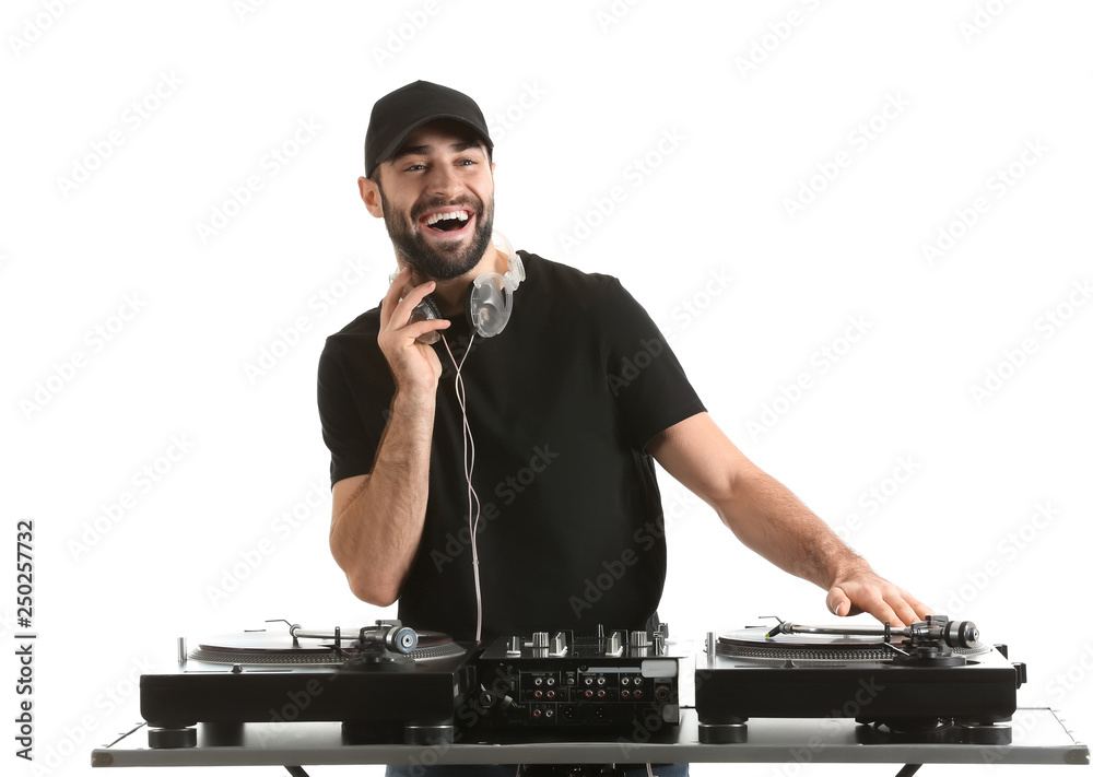 Male DJ playing music on white background