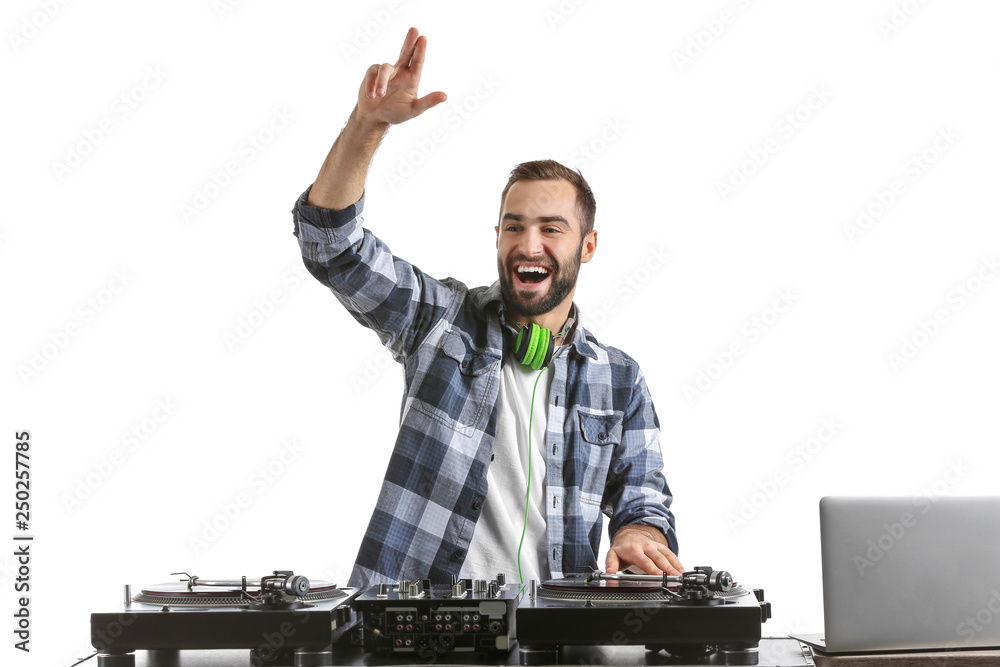 Male DJ playing music on white background