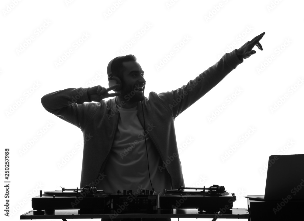 Silhouette of male DJ playing music on white background