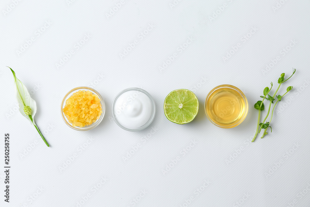 Natural ingredients for cosmetic on white background