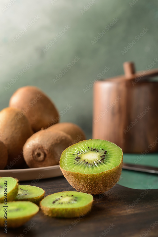 Tasty ripe kiwi on cutting board