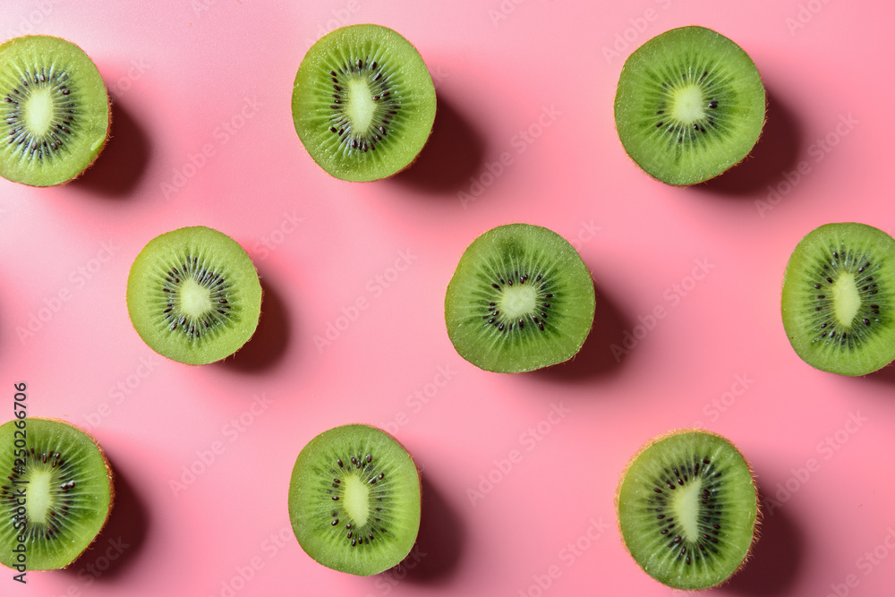 Tasty sliced kiwi on color background