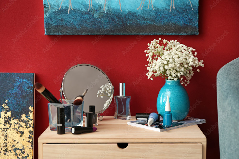 Set of cosmetics on dressing table