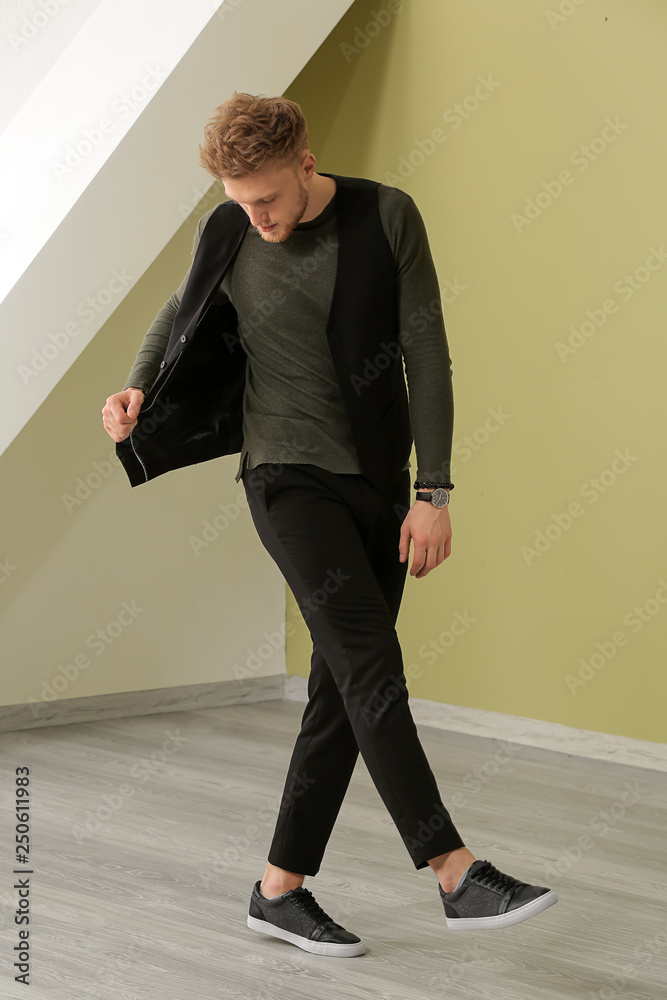 Fashionable young man indoors