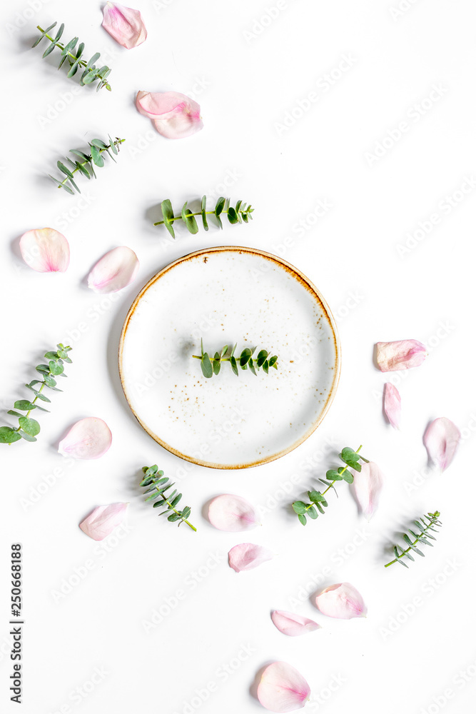 light breakfast disign with flowers on white table top view mock up