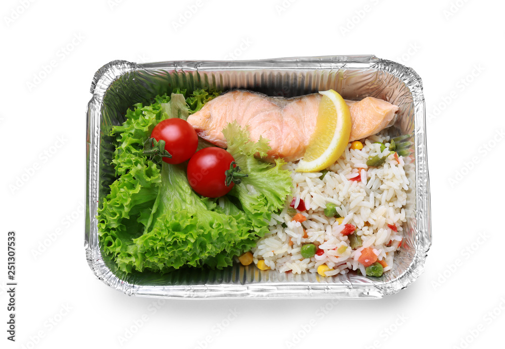 Container with delicious food for delivery on white background