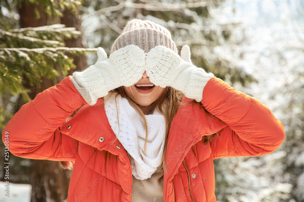 Cute beautiful woman in winter forest