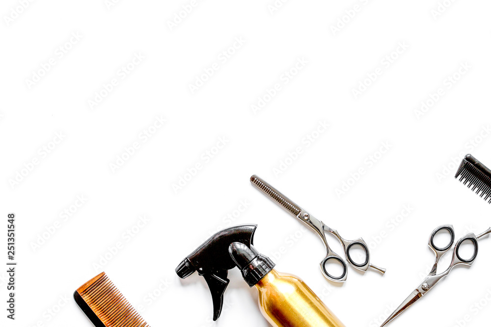 combs and hairdresser tools on white background top view