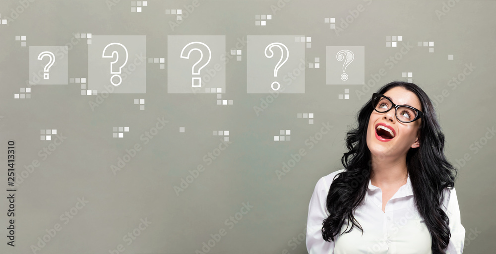 Question marks with young businesswoman in a thoughtful face 