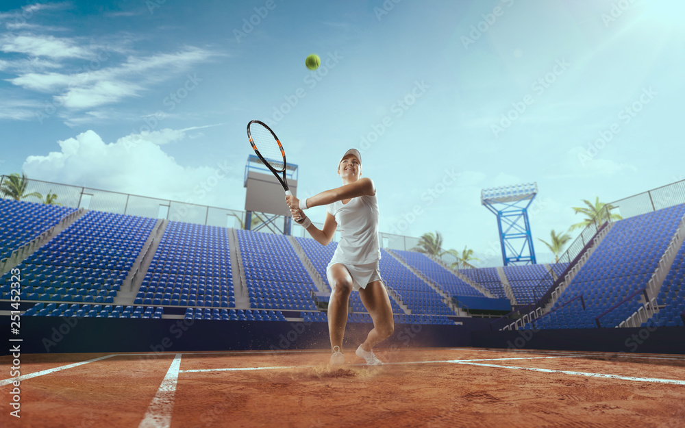 Tennis girl on a professional tennis court.