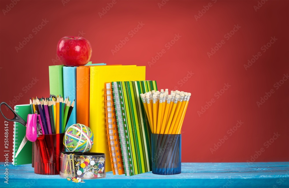 Variety office supplies in little shopping cart