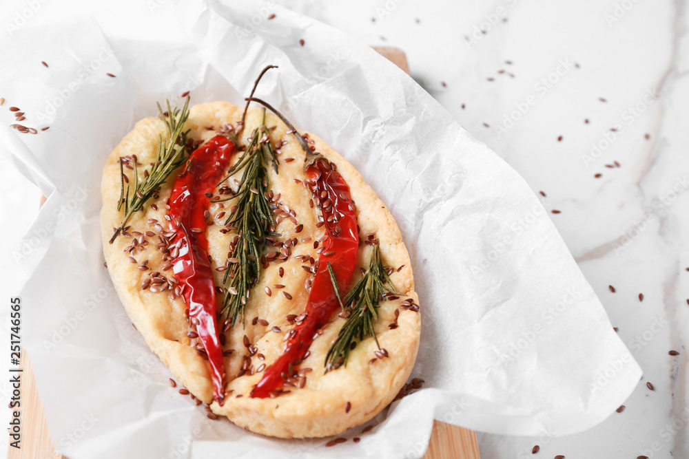 Tasty Italian focaccia on light table