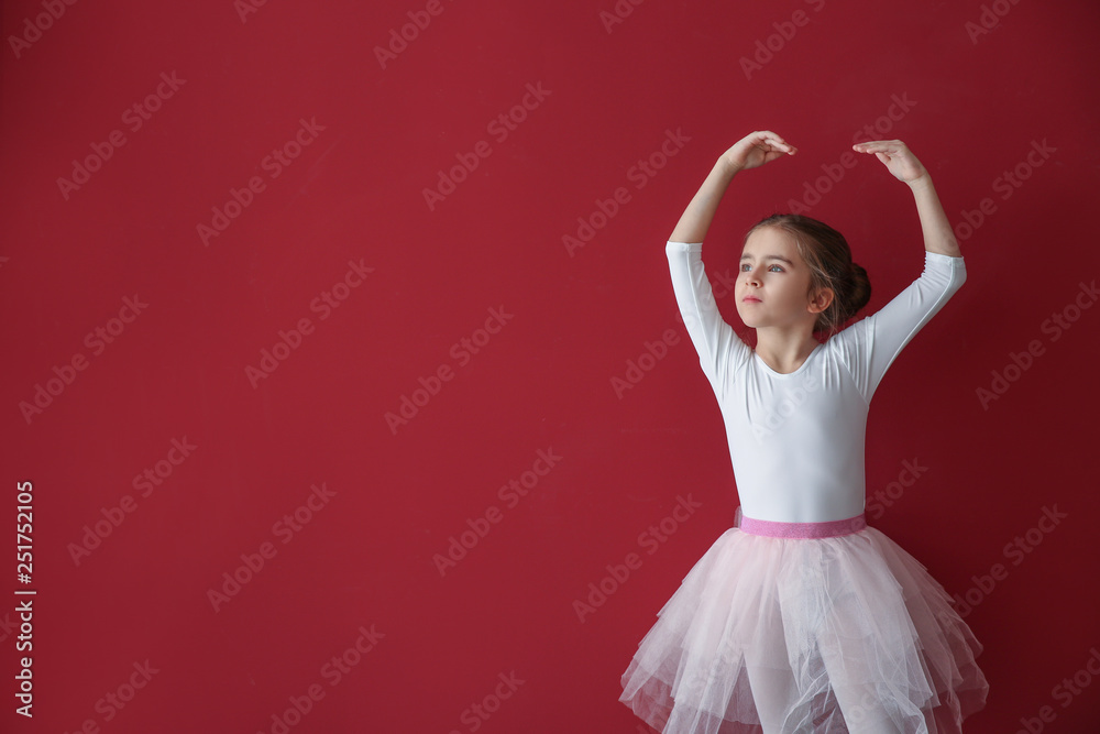 Cute little ballerina on color background