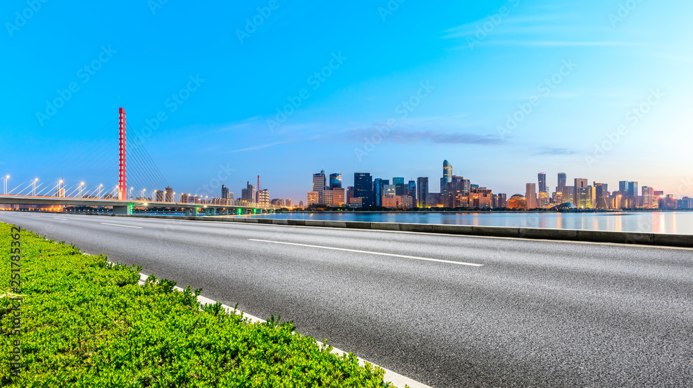 Empty asphalt road through Hangzhou business district,panoramic view