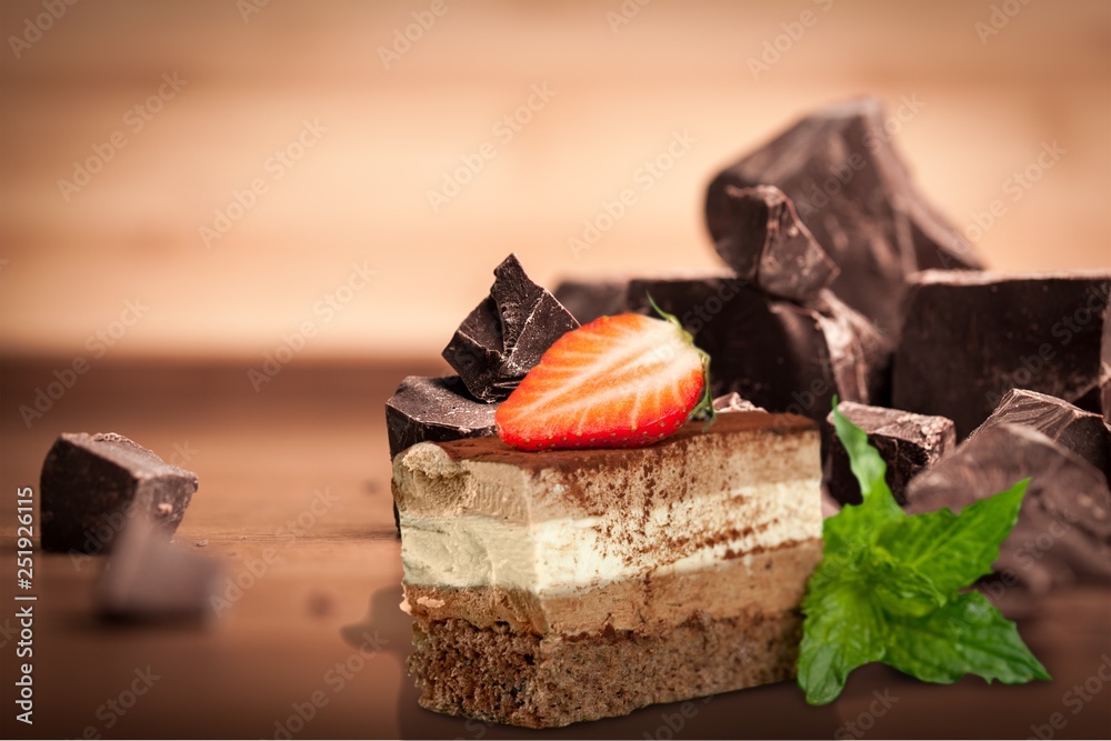 Tasty tiramisu cake  on background