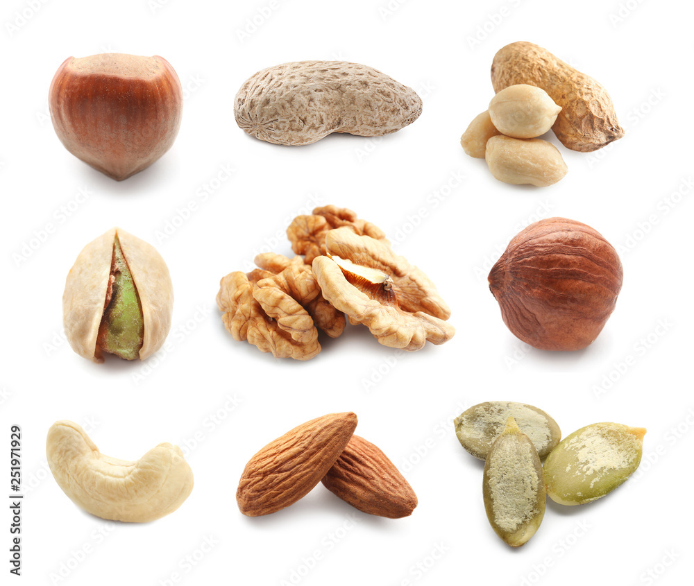 Assortment of tasty nuts on white background