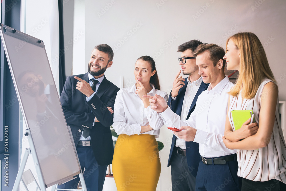 Meeting of business team working in office