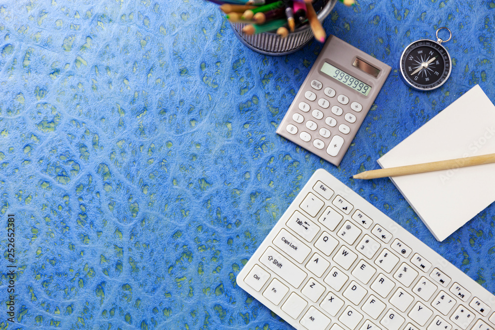 Business objects on blue table background, Business direction concept