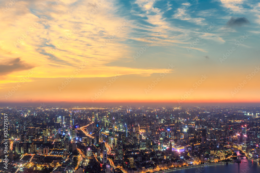 Shanghai city skyline and beautiful colorful clouds at night