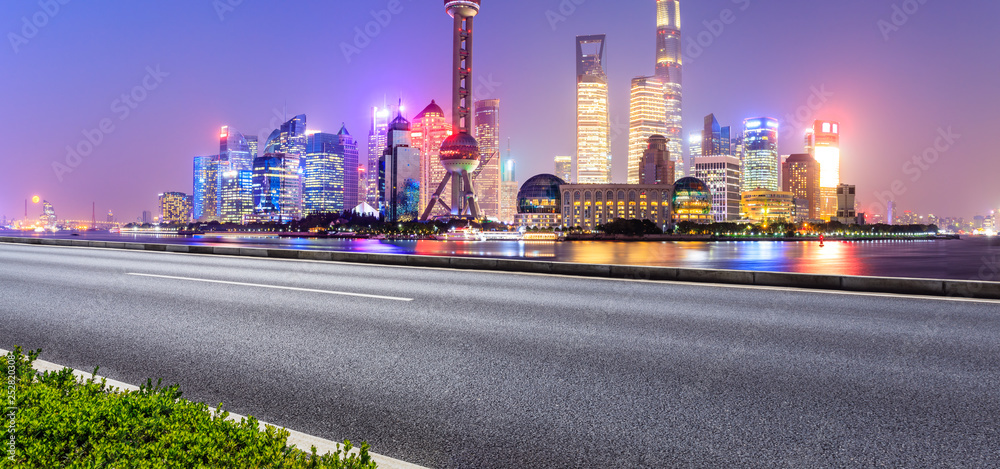 Empty asphalt road through Shanghai business district