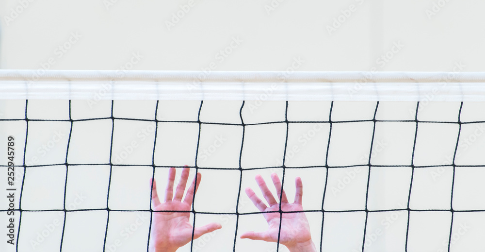 volleyball net with man hands