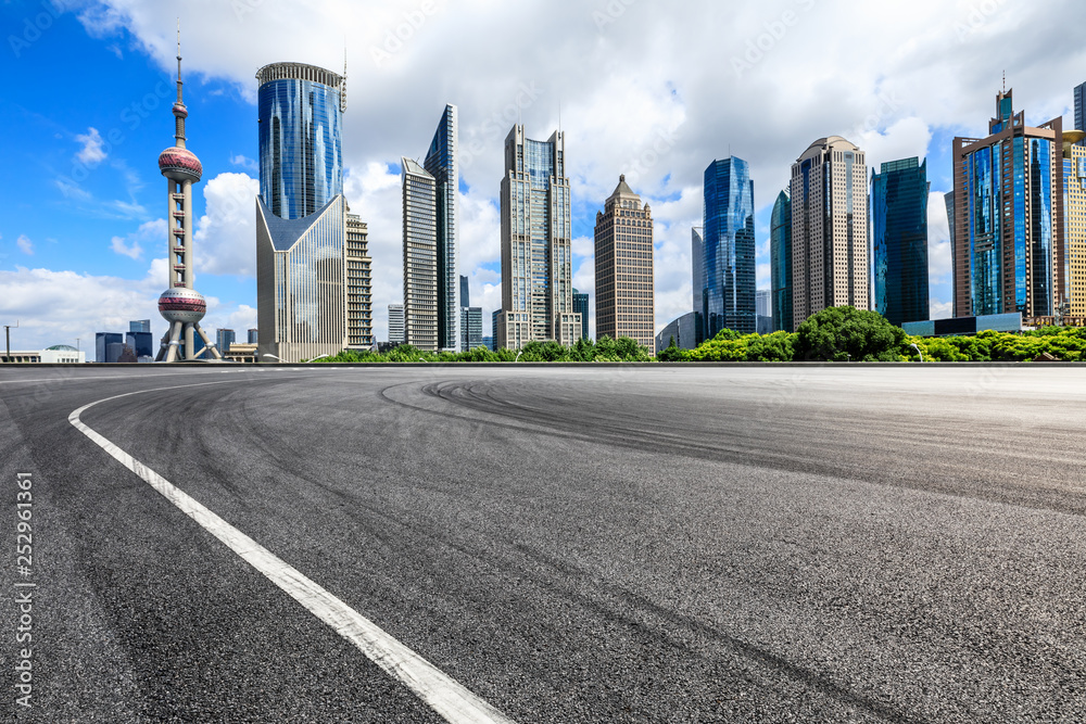 Empty asphalt square ground with panoramic city skyline in Shanghai,China