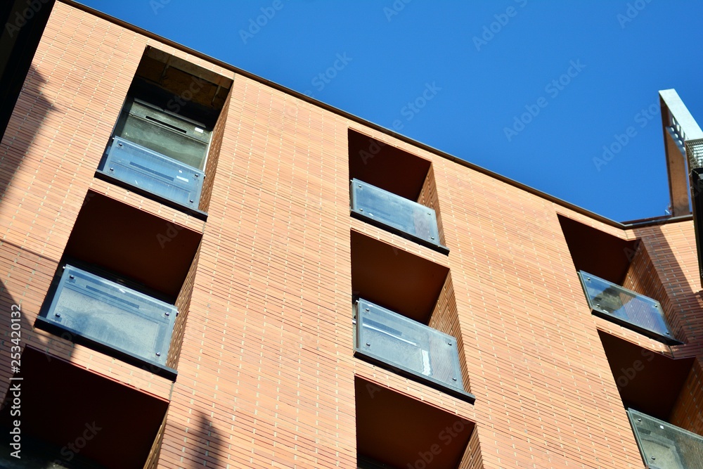 Modern condo building with huge windows