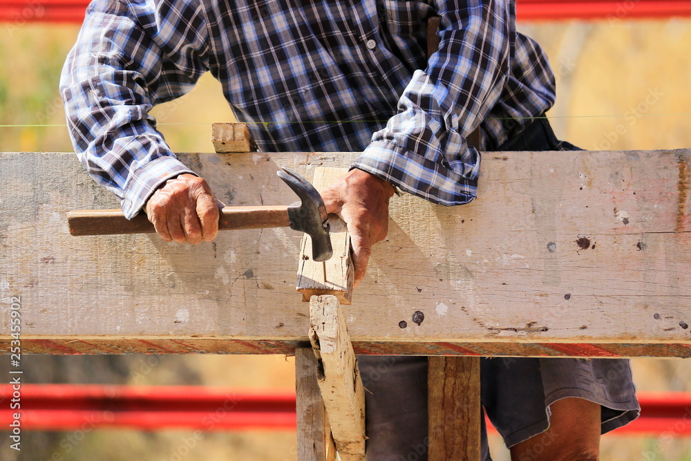 Construction technicians are working on steel, concrete building structures.