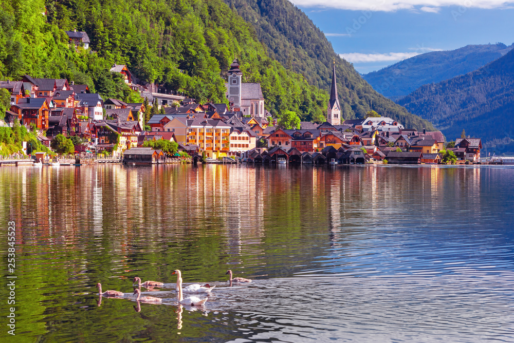 Scenic picture-postcard view of famous Hallstatt, UNESCO mountain village in the Austrian Alps at be