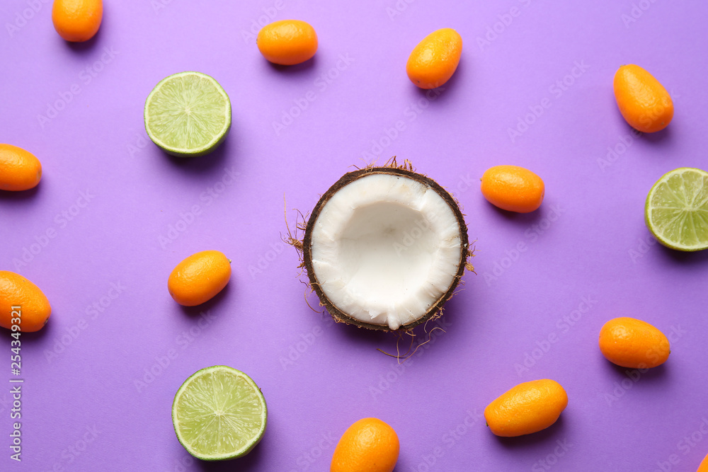 Assortment of tasty exotic fruits on color background