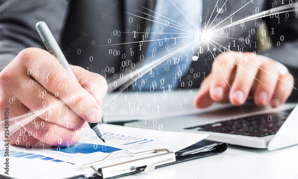 Close-up of Businesswoman makes a note at business document