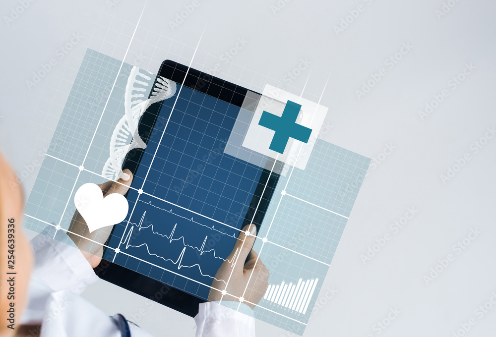 Close of female doctor hands working with tablet pc computer