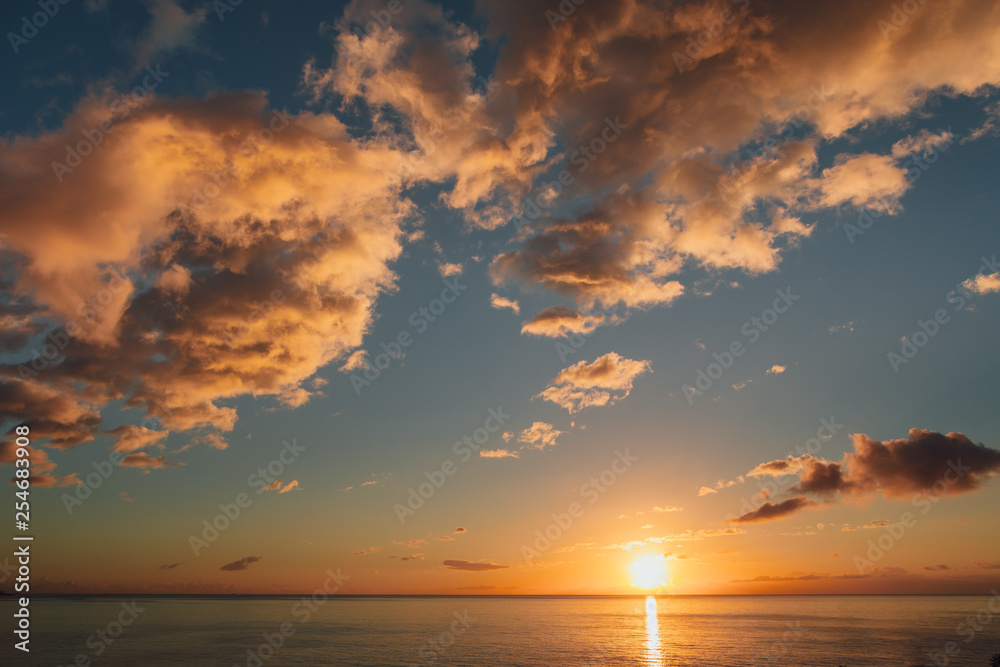 sunrise at ocean seascape with reflection