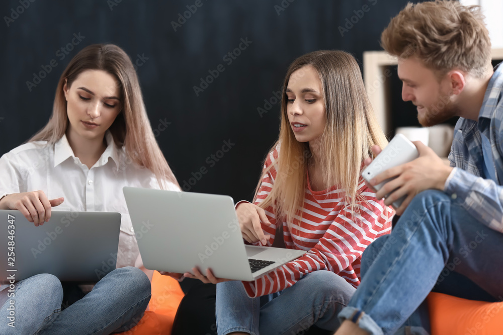 Young IT specialists working in modern office