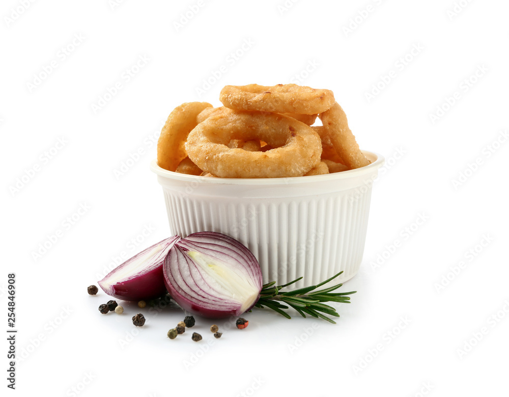 Bowl with tasty onion rings on white background